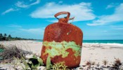 Adrift: gas bottle from a boat on the beach